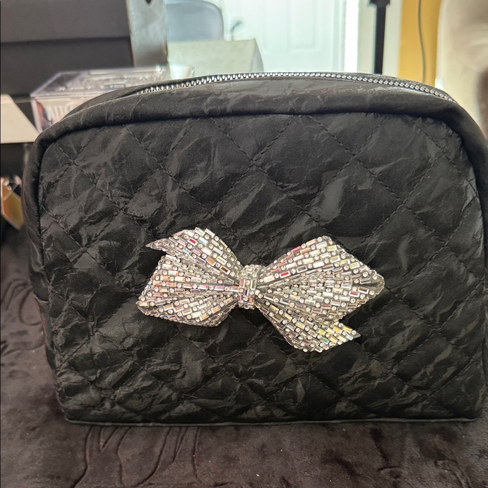 Elegant Black Quilted Bag with Silver Bow